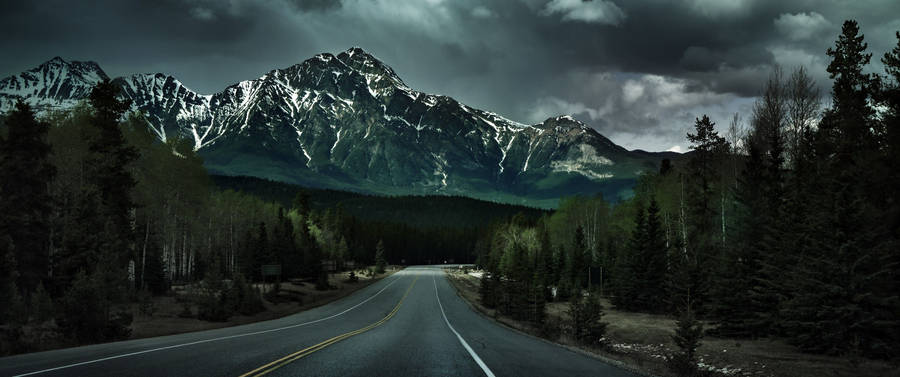 Illuminated Dark Mountain Road Wallpaper