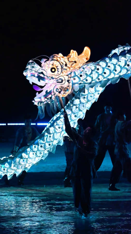 Illuminated Dragon Dance Performance Wallpaper