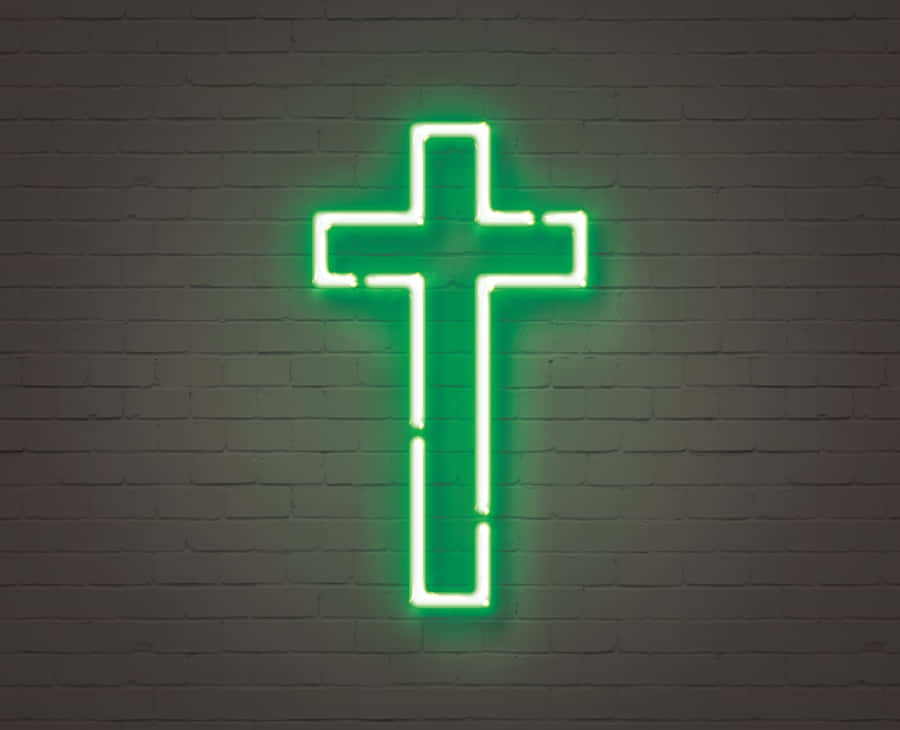Illuminated Neon Cross Against A Night Sky Wallpaper