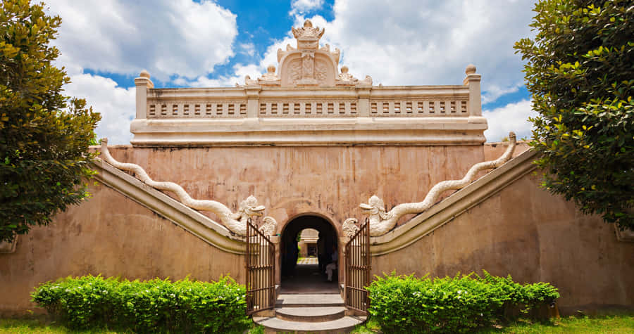 Image A Beautiful Oceanic Landscape With A Sailing Boat Wallpaper