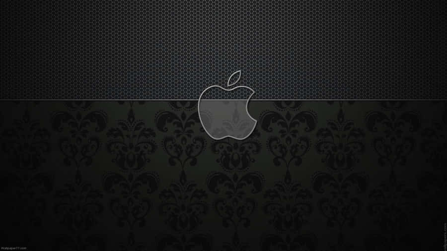 Image A Sleek Black Macbook Laptop, Perfect For Professionals And Creatives Wallpaper