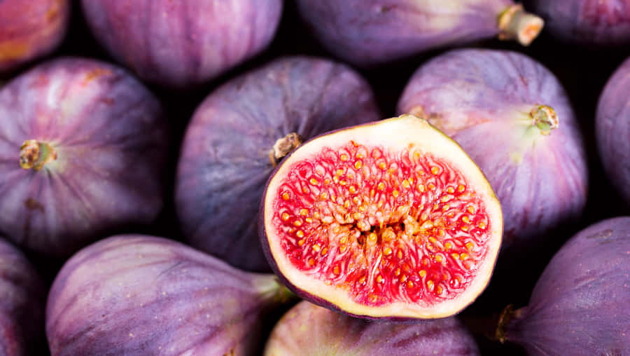 Image Freshly Harvested Purple Figs, Nature's Delicious Treat Wallpaper