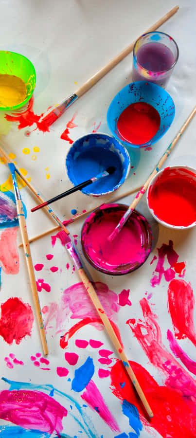 Image Reflection Of A City Skyline In Still Water Wallpaper