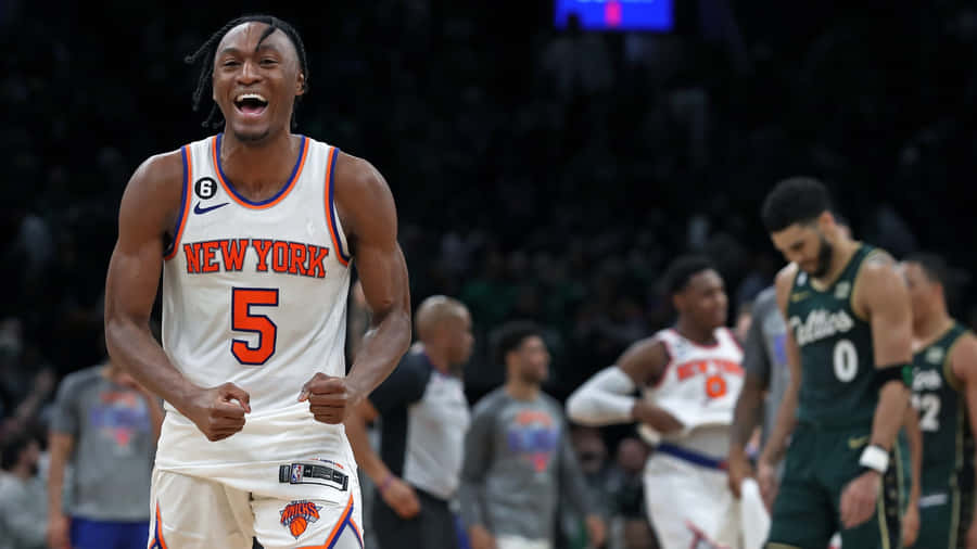 Immanuel Quickley Celebrates Knicks Victory Wallpaper