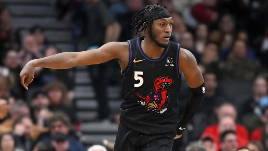 Immanuel Quickley In Action Wallpaper