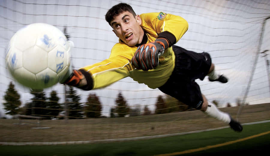 Impressive Save By Proactive Goalkeeper Wallpaper