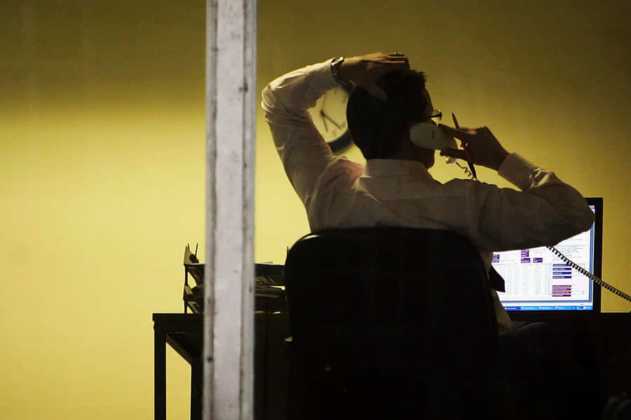 Incompetent Employee On The Phone Wallpaper