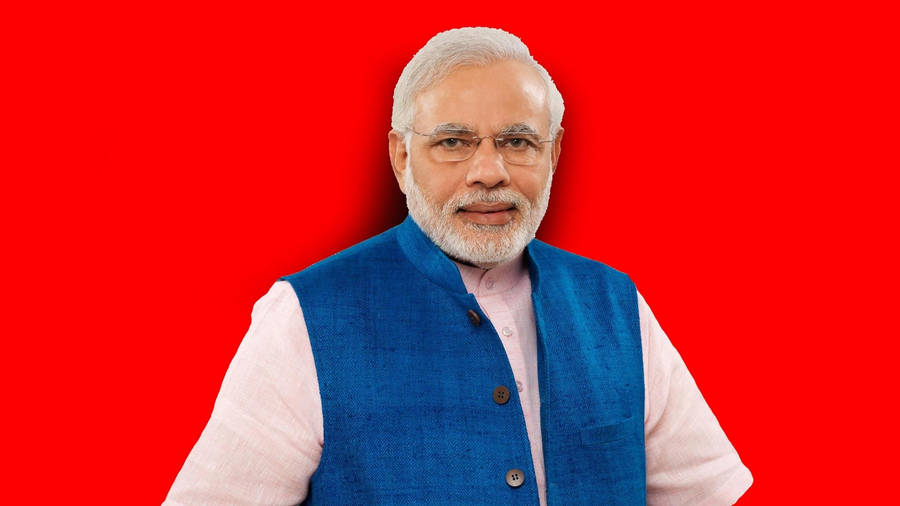 Indian Prime Minister Narendra Modi On A Red Background Wallpaper