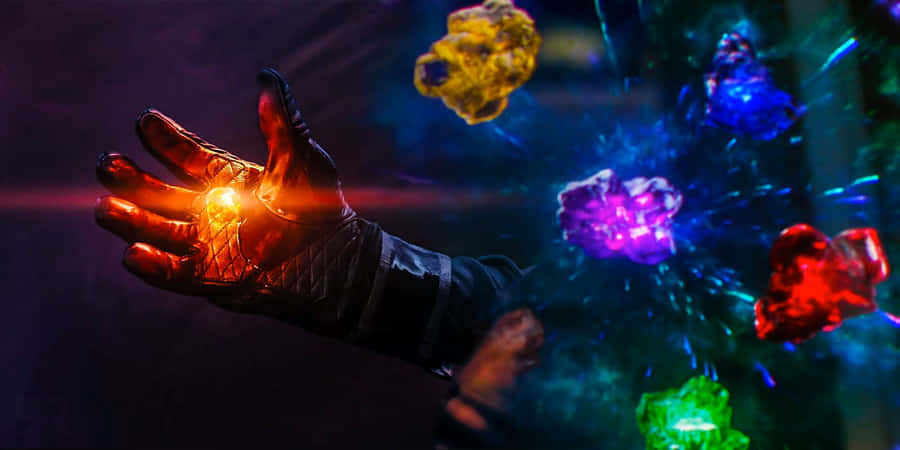 Infinity Stones In Hand Wallpaper