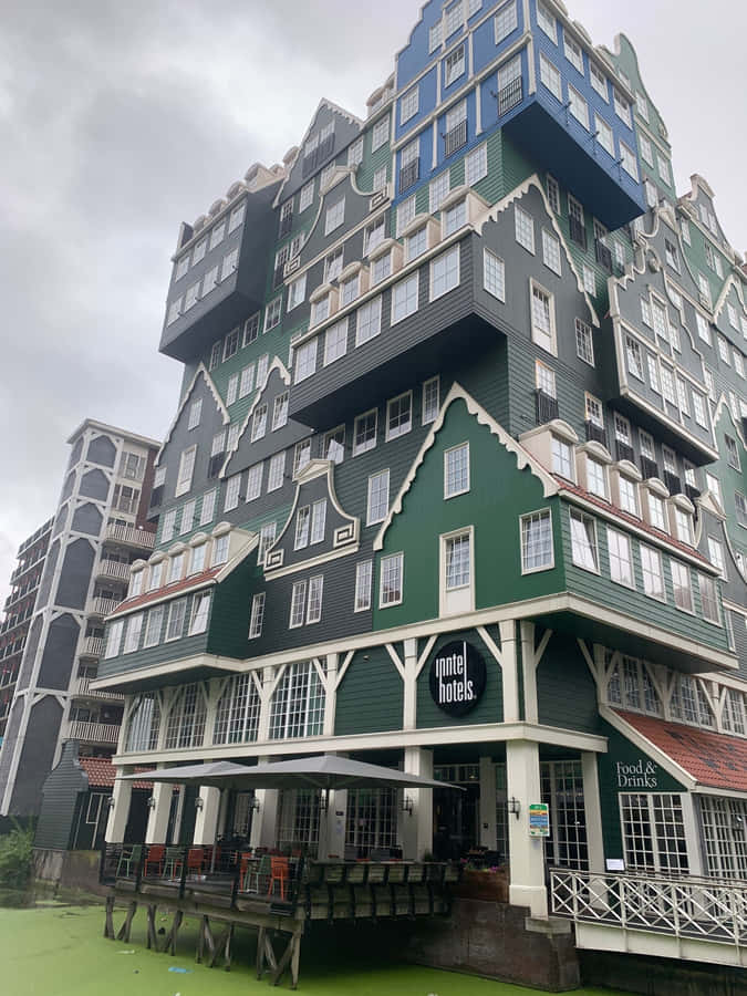 Inntel Hotel Zaandam Under Cloudy Sky Wallpaper