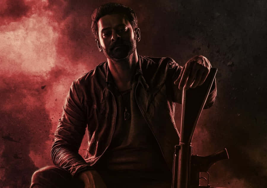 Intense Action Movie Characterwith Gun Wallpaper