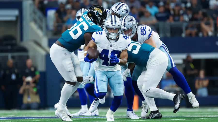 Intense Football Match Action Wallpaper