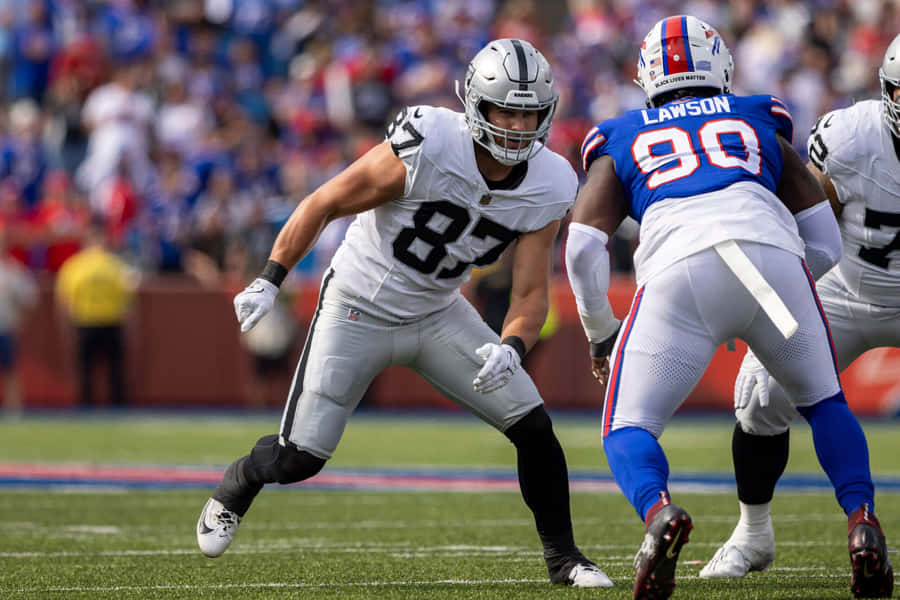 Intense Football Matchup Wallpaper