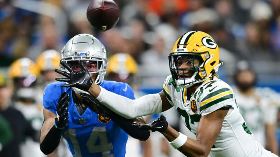 Intense Football Matchup Wallpaper