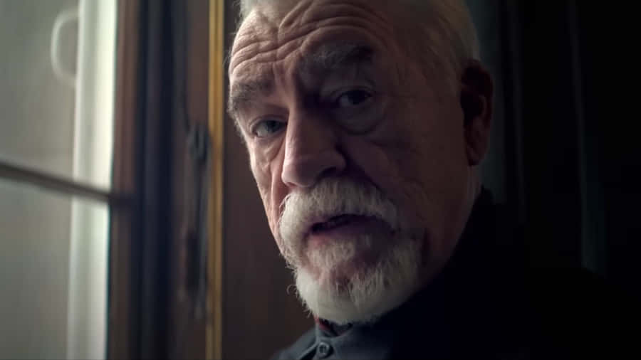 Intense Gaze Man Portrait Wallpaper