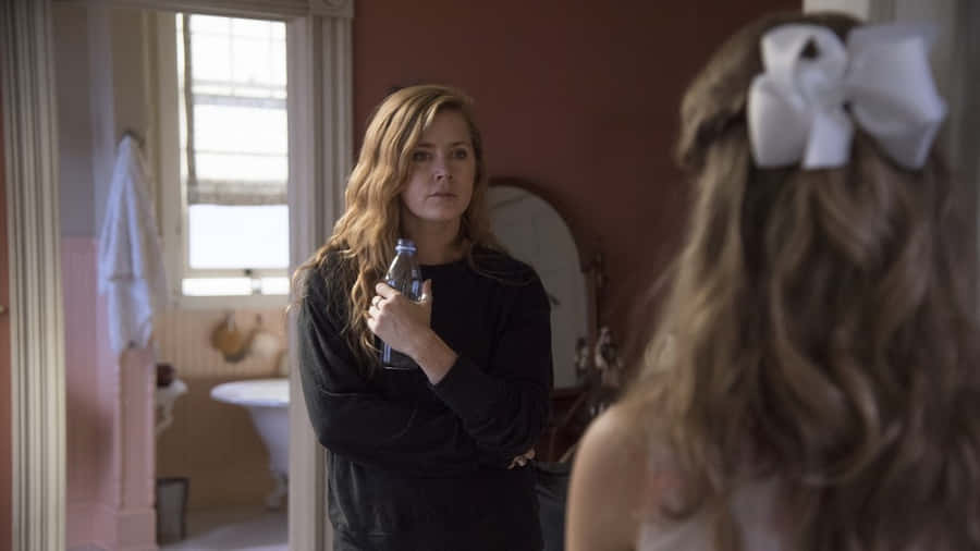 Intense Mirror Stare Scene Wallpaper