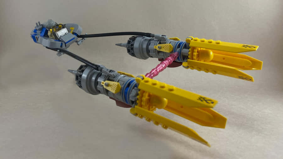 Intense Podracing Competition In High-speed Action Wallpaper