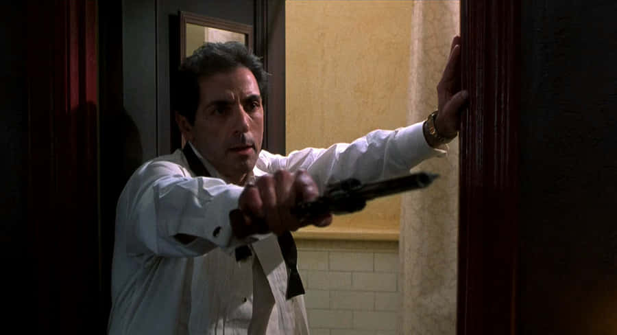 Intense Scenewith Gunman Wallpaper