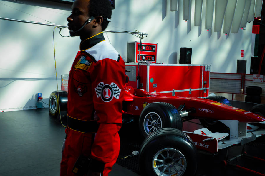 Intense Speed: Formula One Race Car In Action Wallpaper