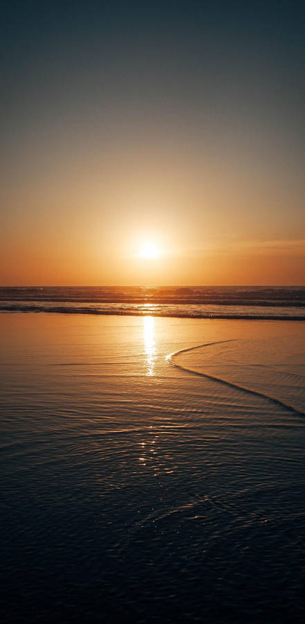 Iphone 12 Pro Sunset Reflection Wallpaper