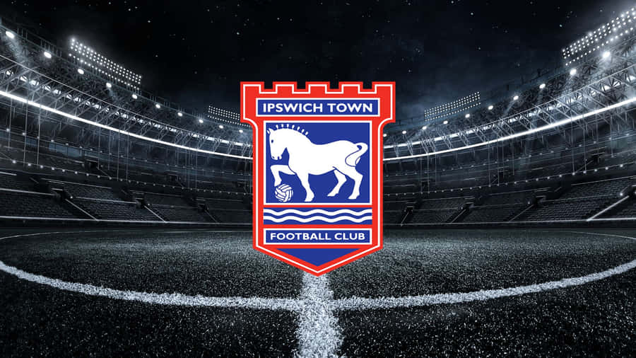 Ipswich Town Football Club In Action On The Pitch Wallpaper