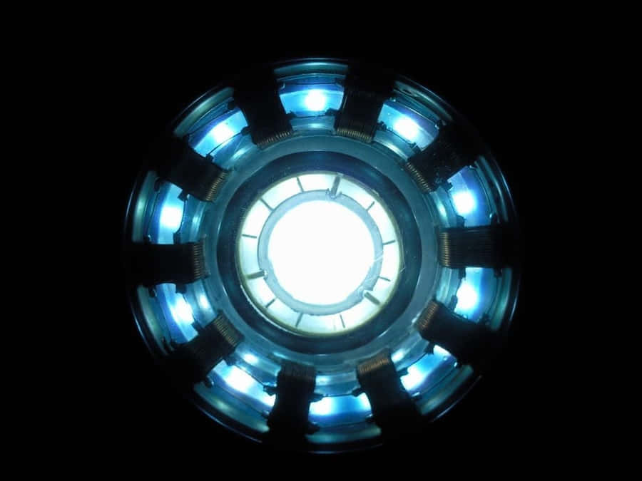 Iron Man Monument Illuminated By A Powerful Arc Reactor Wallpaper