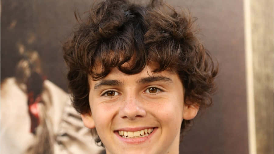 Jack Dylan Grazer Smiling Portrait Wallpaper