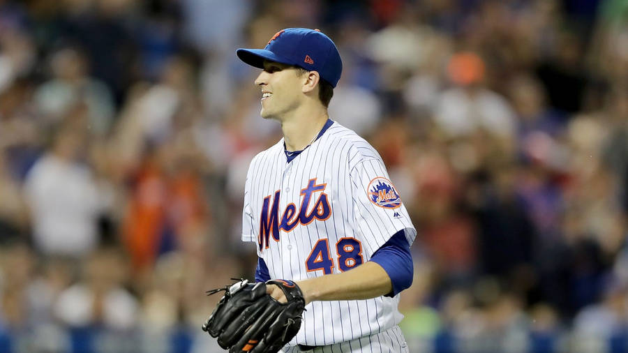 Jacob Degrom Wearing A Baseball Glove Wallpaper