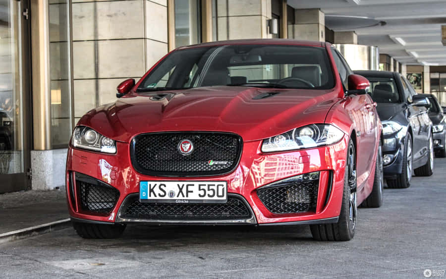 Jaguar Xfr Luxury Sports Sedan In Motion Wallpaper