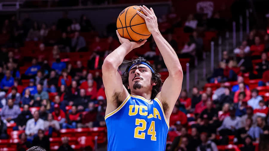 Jaime Jaquez Jr In Action During The Ucla Basketball Game. Wallpaper