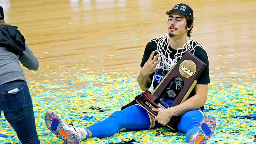 Jaime Jaquez Jr In Action On The Court Wallpaper