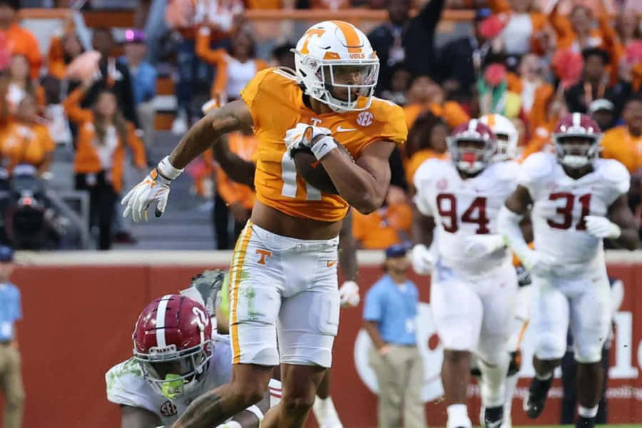 Jalin Hyatt Catching Football During Game Wallpaper