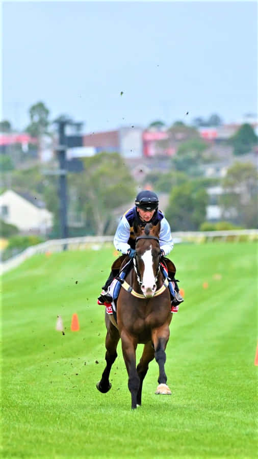 Jamie Kah - Champion Jockey In Action Wallpaper