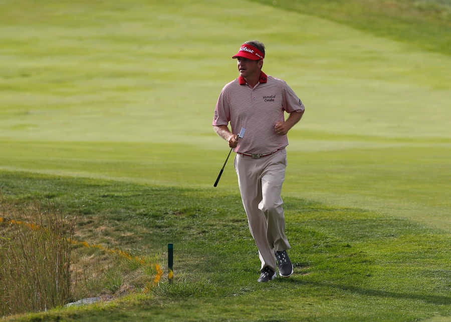 Jason Bohn Running On Golf Course Wallpaper