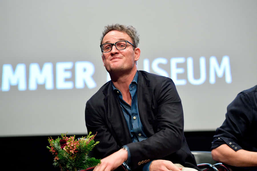 Jason Clarke Speaking Event Wallpaper