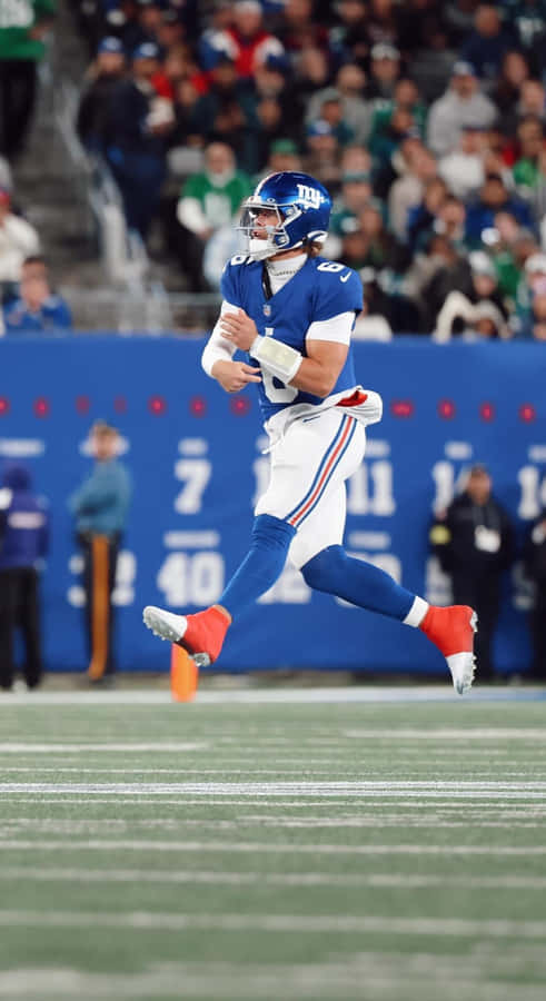 Jaxson Dart In Giants Uniform Wallpaper