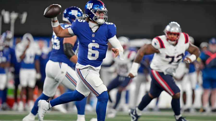 Jaxson Dart N F L Quarterback Action Wallpaper