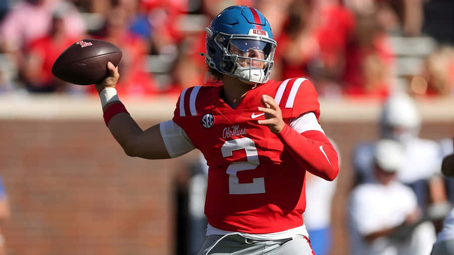 Jaxson Dart Throwing Pass Wallpaper