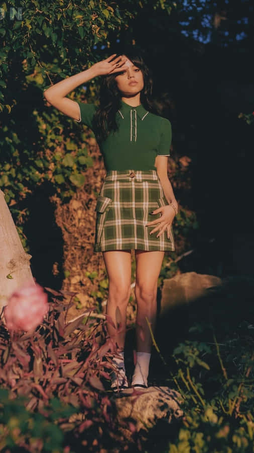 Jenna Ortega Green Outfit Nature Backdrop Wallpaper