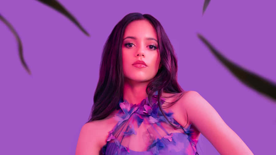Jenna Ortega Purple Backdrop Portrait Wallpaper