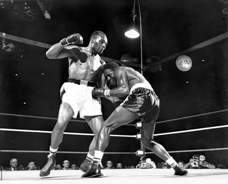 Jersey Joe Walcott's Knock-out Punch To Ezzard Charles Wallpaper