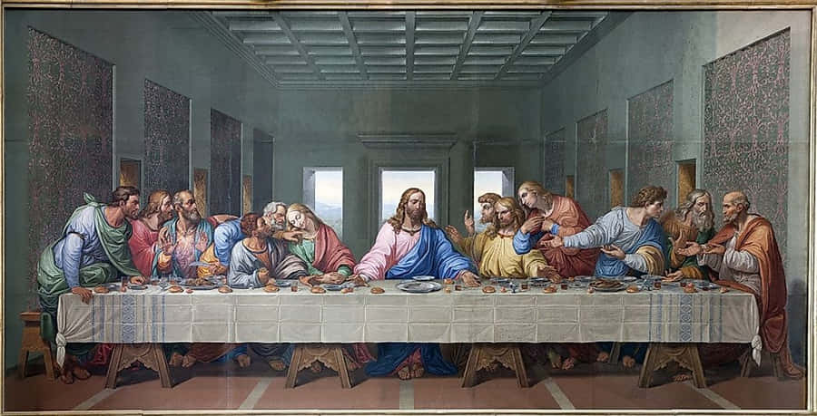 Jesus And His Disciples Sharing A Meal Wallpaper