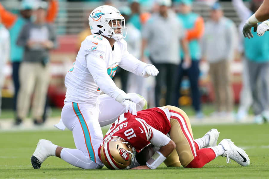 Jimmy Garoppolo, Nfl Quarterback, On The Field Wallpaper