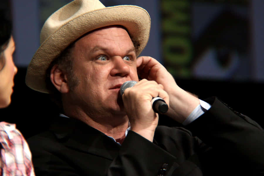 John C. Reilly Striking A Candid Pose Against A White Background Wallpaper