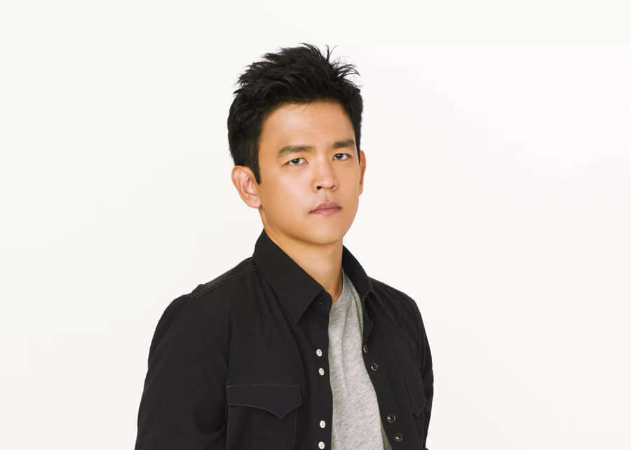 John Cho Striking A Pose In A Semi-formal Attire Wallpaper
