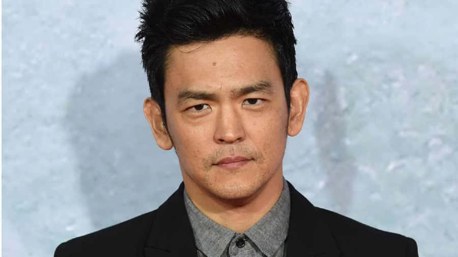 John Cho: The Hollywood Star In Action Wallpaper