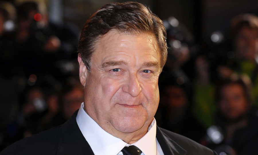 John Goodman In A Thoughtful Pose Wallpaper