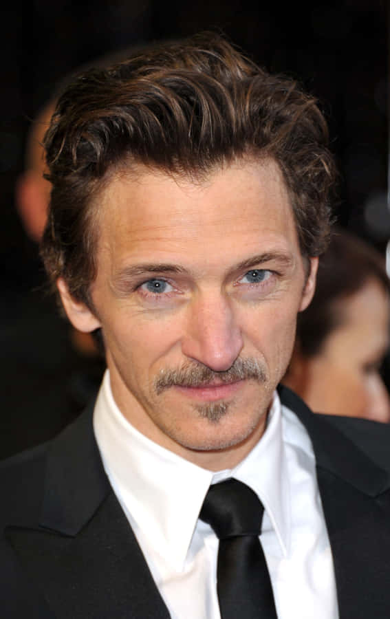 John Hawkes Posing For A Photoshoot Wallpaper