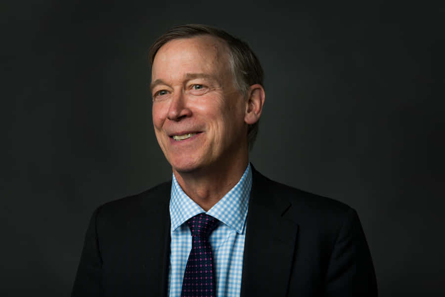 John Hickenlooper With A Dark Gray Background Wallpaper