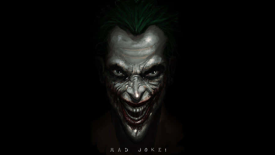 Joker's Maniacal Laughter In The Dark Wallpaper